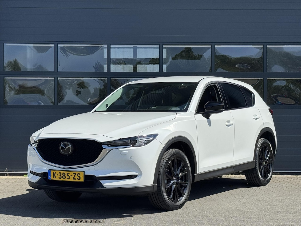Mazda CX-5 - 2.0 SKYACTIV-G 165 SPORTIVE I AUTOMAAT I TREKHAAK (2000KG) I 360° CAMERA I NAVIGATIE I BOS - AutoWereld.nl