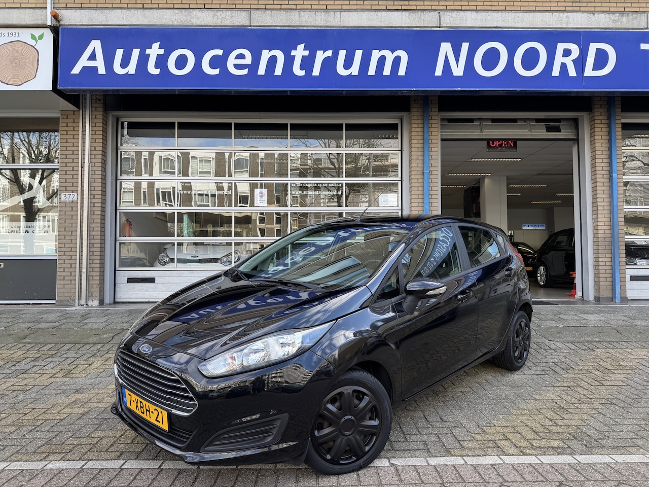 Ford Fiesta - 1.0 Style 74159KM! NAP | Nieuwe Distributieriem | Navigatie | Airco | 5 Deurs | Bluetooth - AutoWereld.nl