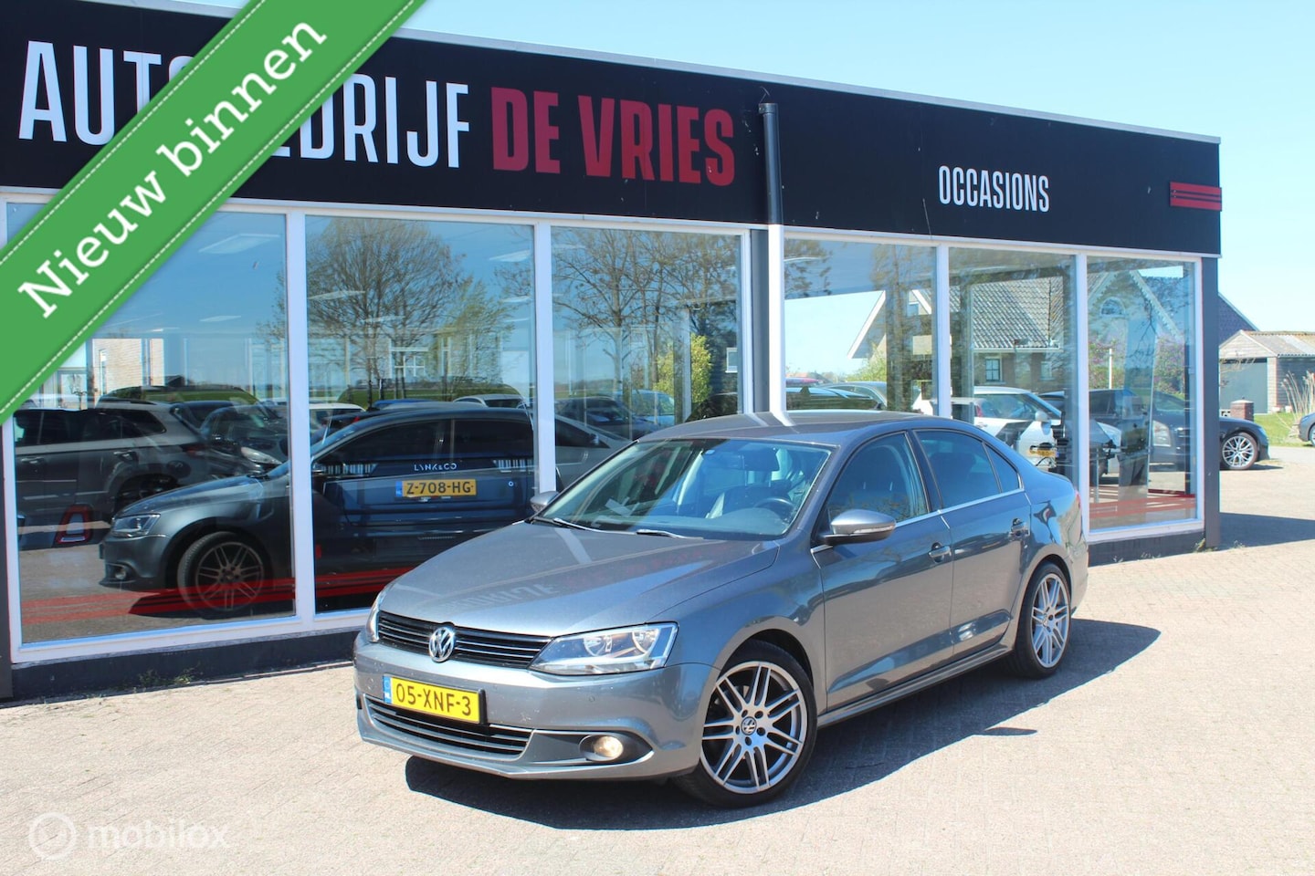 Volkswagen Jetta - 1.4 TSI Aut Highline Leder/18Inch/Navi/ECC - AutoWereld.nl
