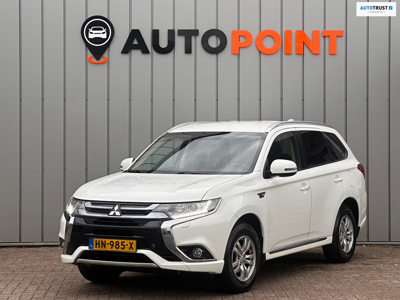 Mitsubishi Outlander - 2.0 PHEV Business Edition alcantara camera - AutoWereld.nl