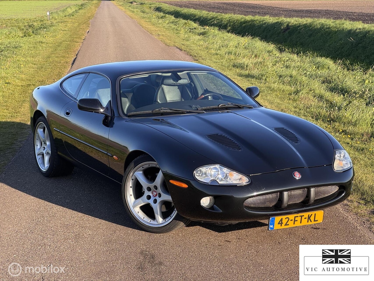 Jaguar XKR - 4.0 V8 Coupé met Recaro interieur - AutoWereld.nl