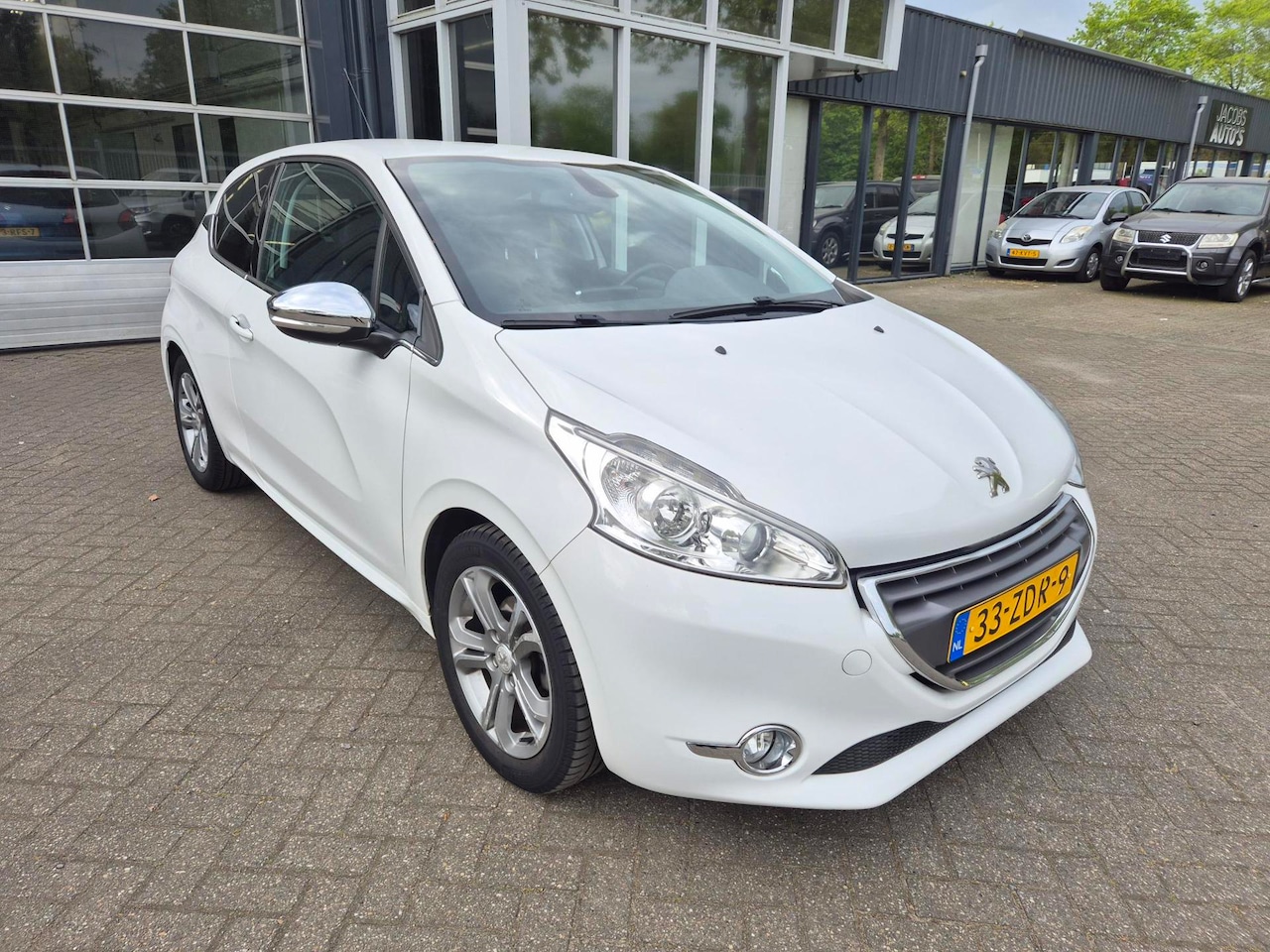 Peugeot 208 - 1.2 VTi Allure Navi - AutoWereld.nl