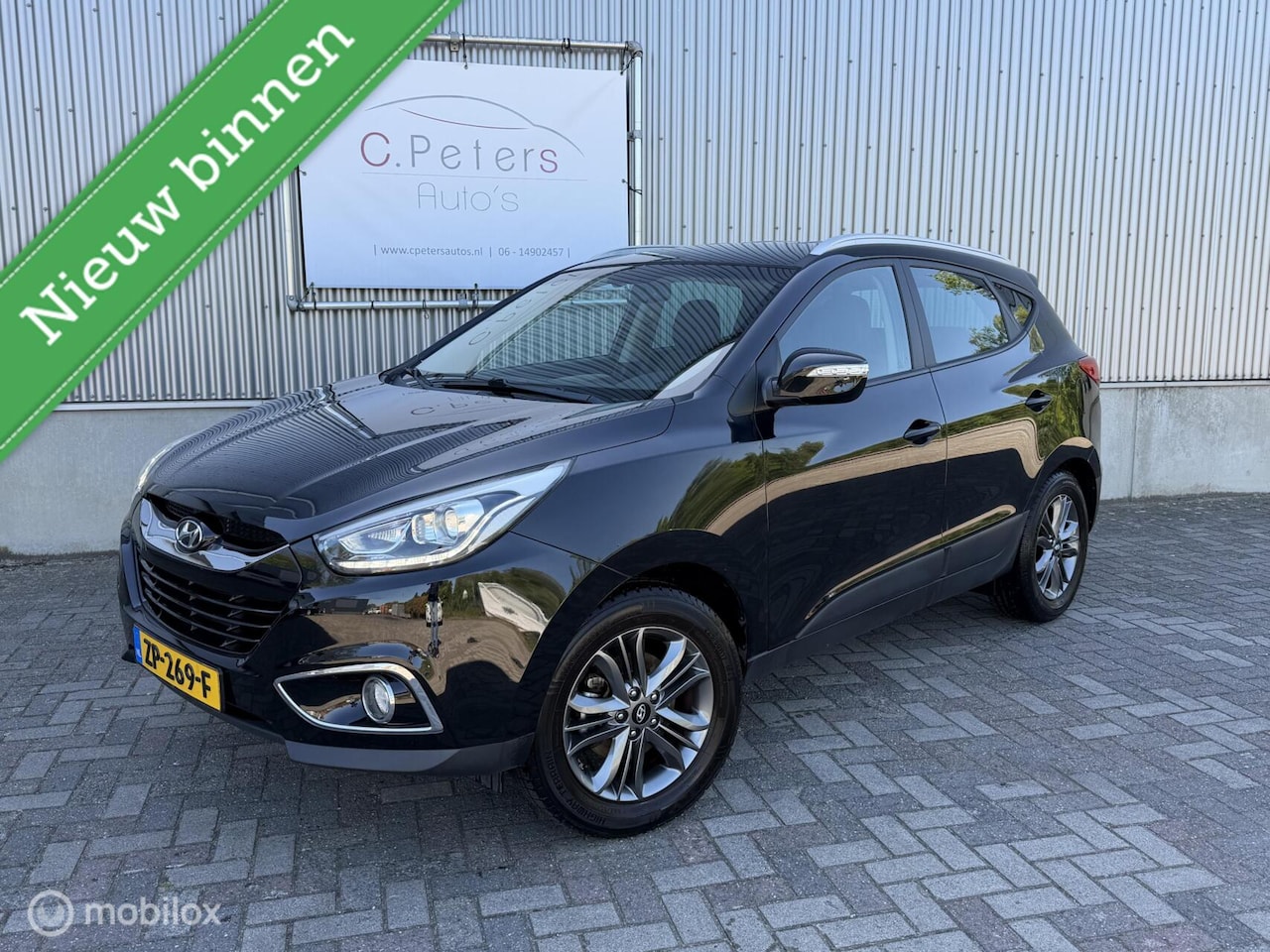 Hyundai ix35 - 1.6i GDI i-Vision 2014 / Facelift Model / LED / Trekhaak / Camera / Stoelverwarming / Navi - AutoWereld.nl