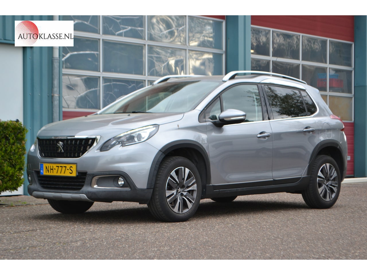 Peugeot 2008 - 1.2 PureTech Allure AUTOMAAT - AutoWereld.nl