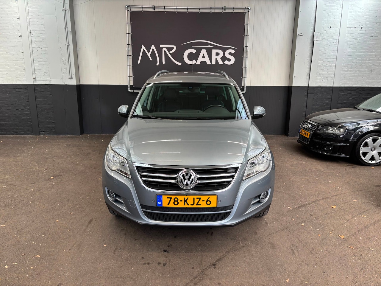 Volkswagen Tiguan - 2.0 TSI Sport&Style 4Motion leder/navi - AutoWereld.nl