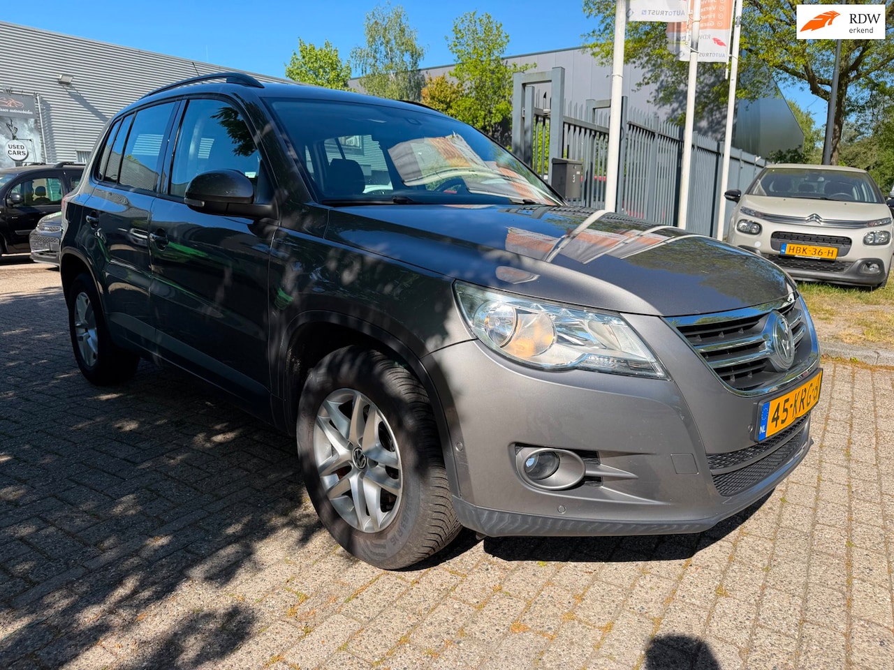 Volkswagen Tiguan - 1.4 TSI Comfort&Design 4Motion 150 pk, navi, cruise, elec pakket trekhaak, pdc, multi-stuu - AutoWereld.nl