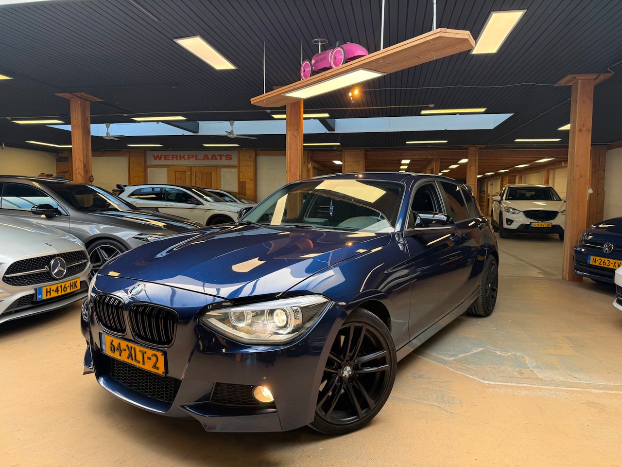 BMW 1-serie - 125i Business+ M-Pakket M135i Sport Xenon Carplay VOL - AutoWereld.nl