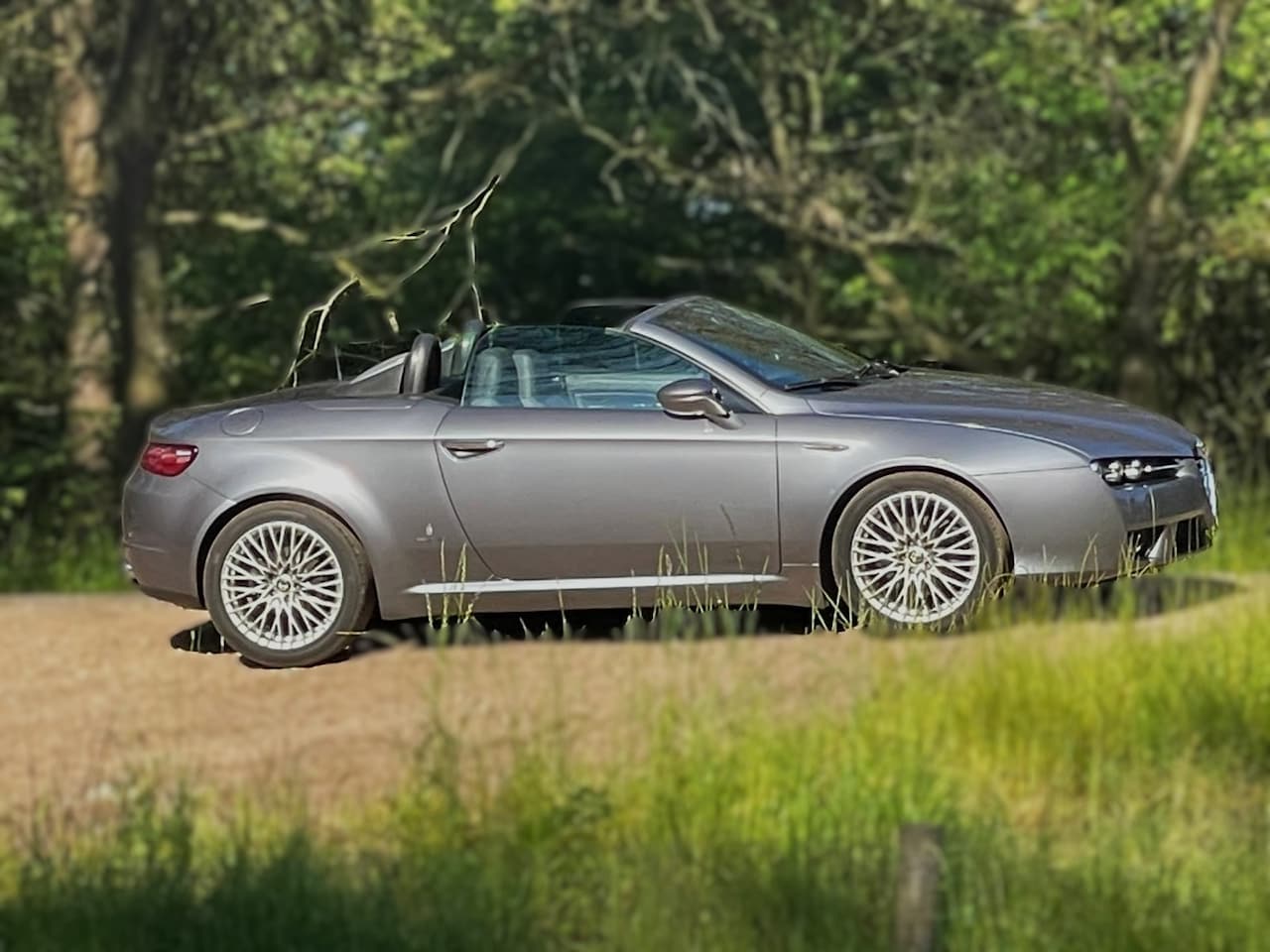 Alfa Romeo Spider - 2.2 JTS Exclusive Zeer goed onderhouden Spider, historie bekend en weinig kilometers. - AutoWereld.nl