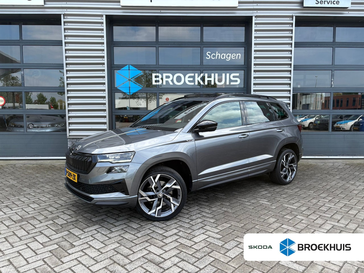 Skoda Karoq - 1.5 TSI 150 pk ACT Sportline Business 7-DSG | Trekhaak wegklapbaar | Elektrisch Panoramada - AutoWereld.nl