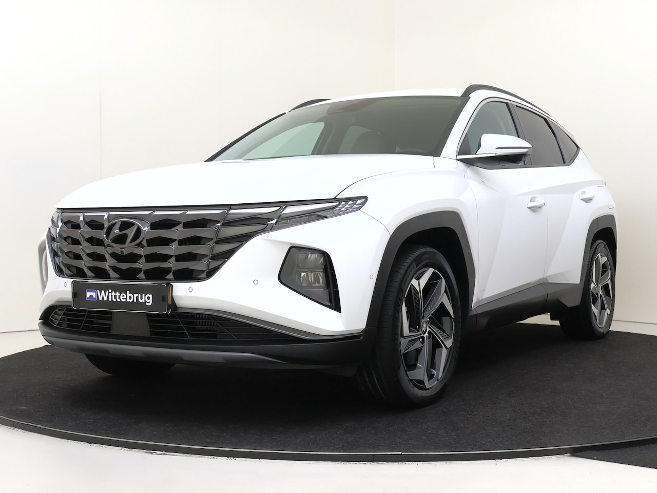 Hyundai Tucson - 1.6 T-GDI PHEV Premium 4WD TREKHAAK | LICHT LEDEREN INTERIEUR | FULL LED | KEYLESS | ZEER - AutoWereld.nl