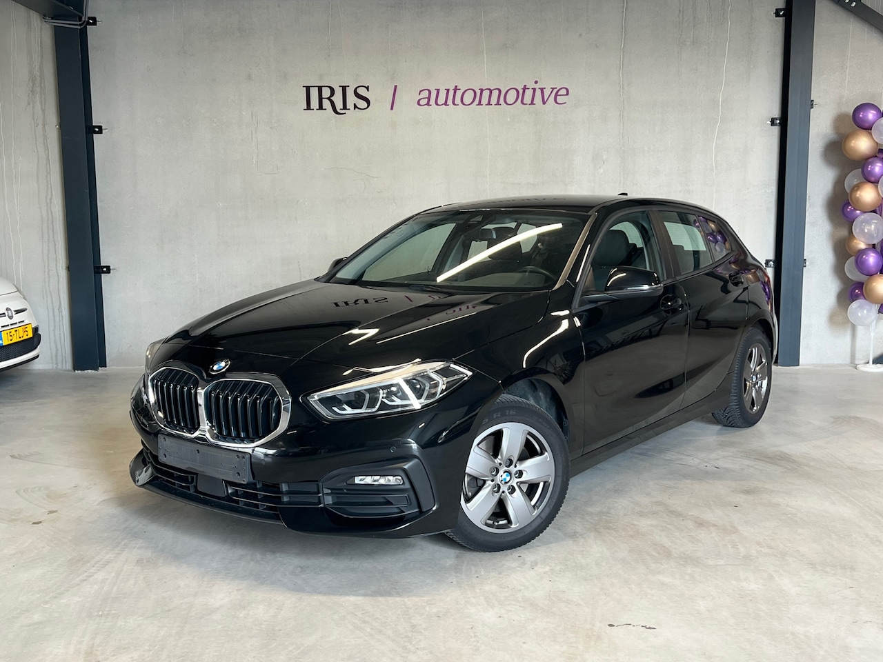 BMW 1-serie - 118i Executive - PDC v/a - climate control - cruise control - stoelverwarming - AutoWereld.nl