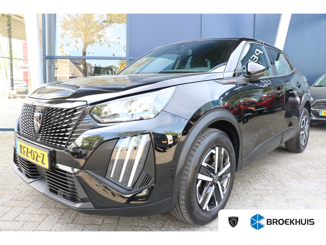 Peugeot 2008 - 1.2 Hybrid 136 Style | Parkeerhulp achter | LMV | Apple Carplay | Climate control | Cruise - AutoWereld.nl