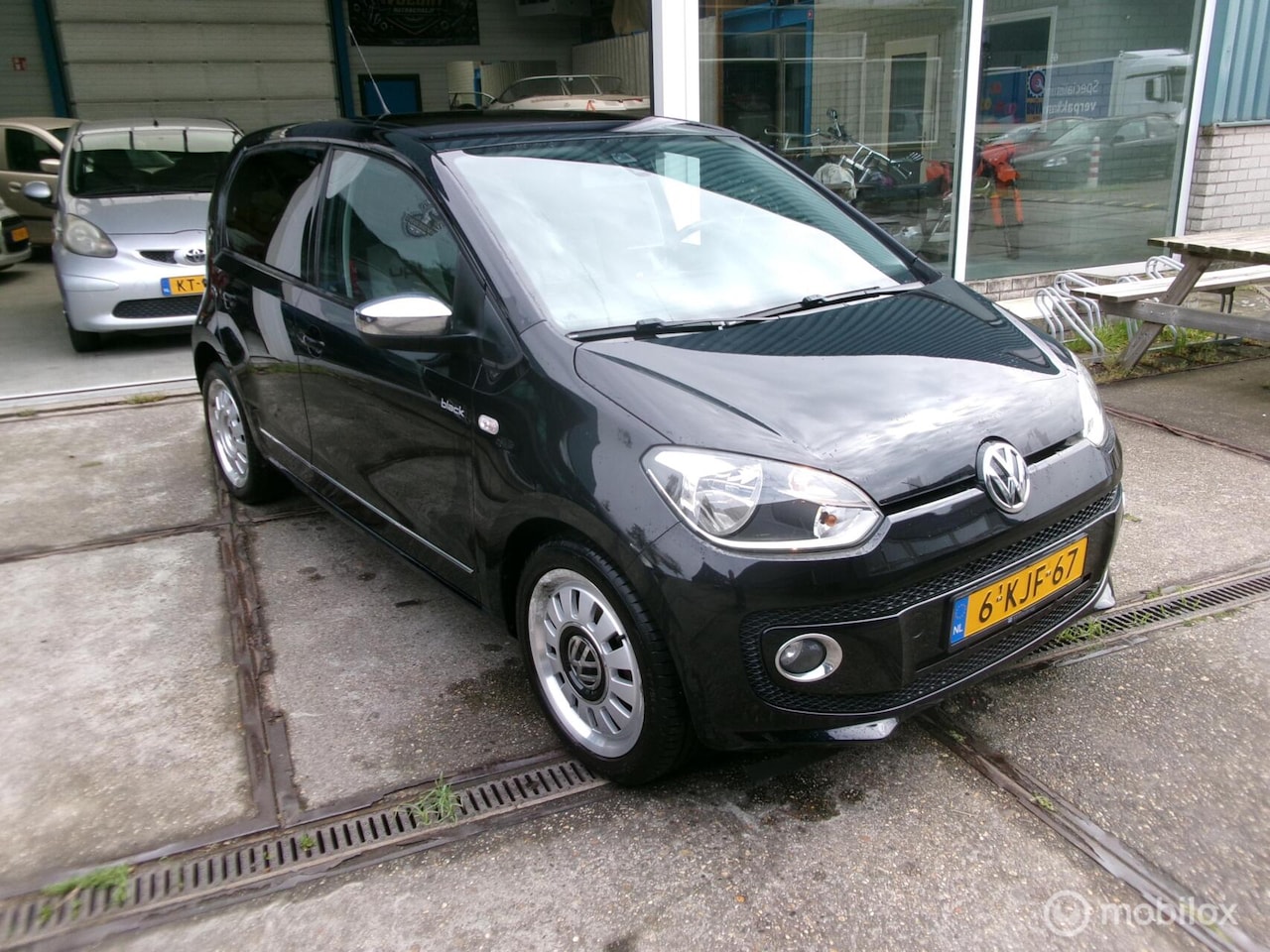 Volkswagen Up! - 1.0 move up! BlueMotion open dak . - AutoWereld.nl