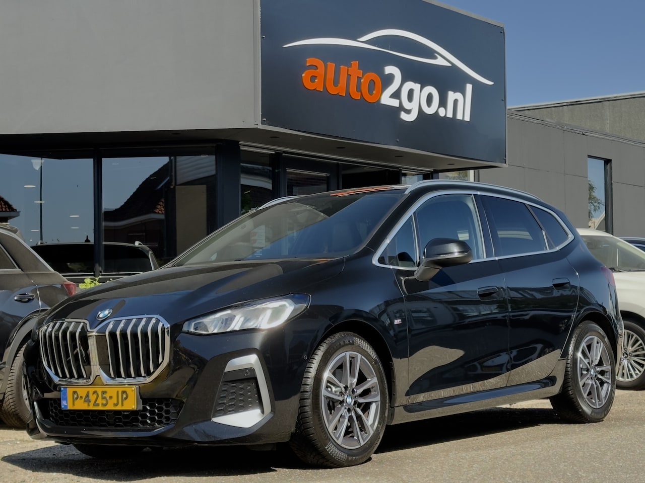 BMW 2-serie Active Tourer - 218i AUT7 M-SPORT LEDER NAVI CAMERA DIGI-DASH APPLE-CARPLAY LED LMV PDC - AutoWereld.nl