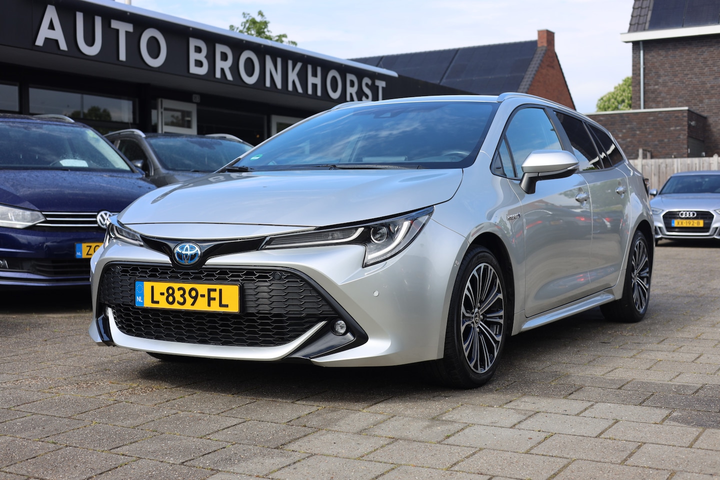Toyota Corolla Touring Sports - 2.0 HYBRID BUSINESS GR-SPORT I CAMERA I CARPLAY I ADAPTIEF CC - AutoWereld.nl