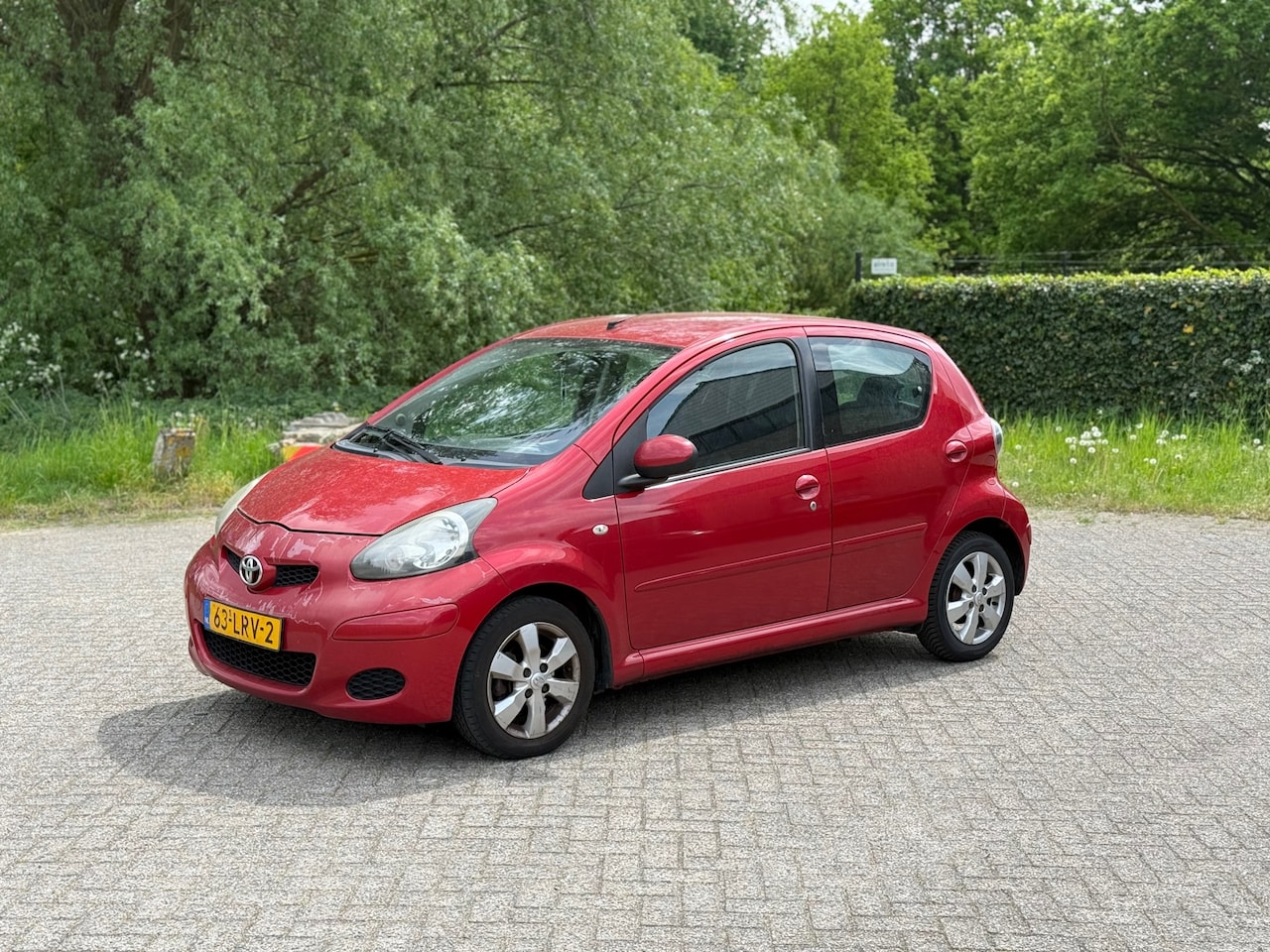 Toyota Aygo - 1.0-12V Aspiration Red AIRCO I LEER I 5DRS I INRUILKOOPJE - AutoWereld.nl