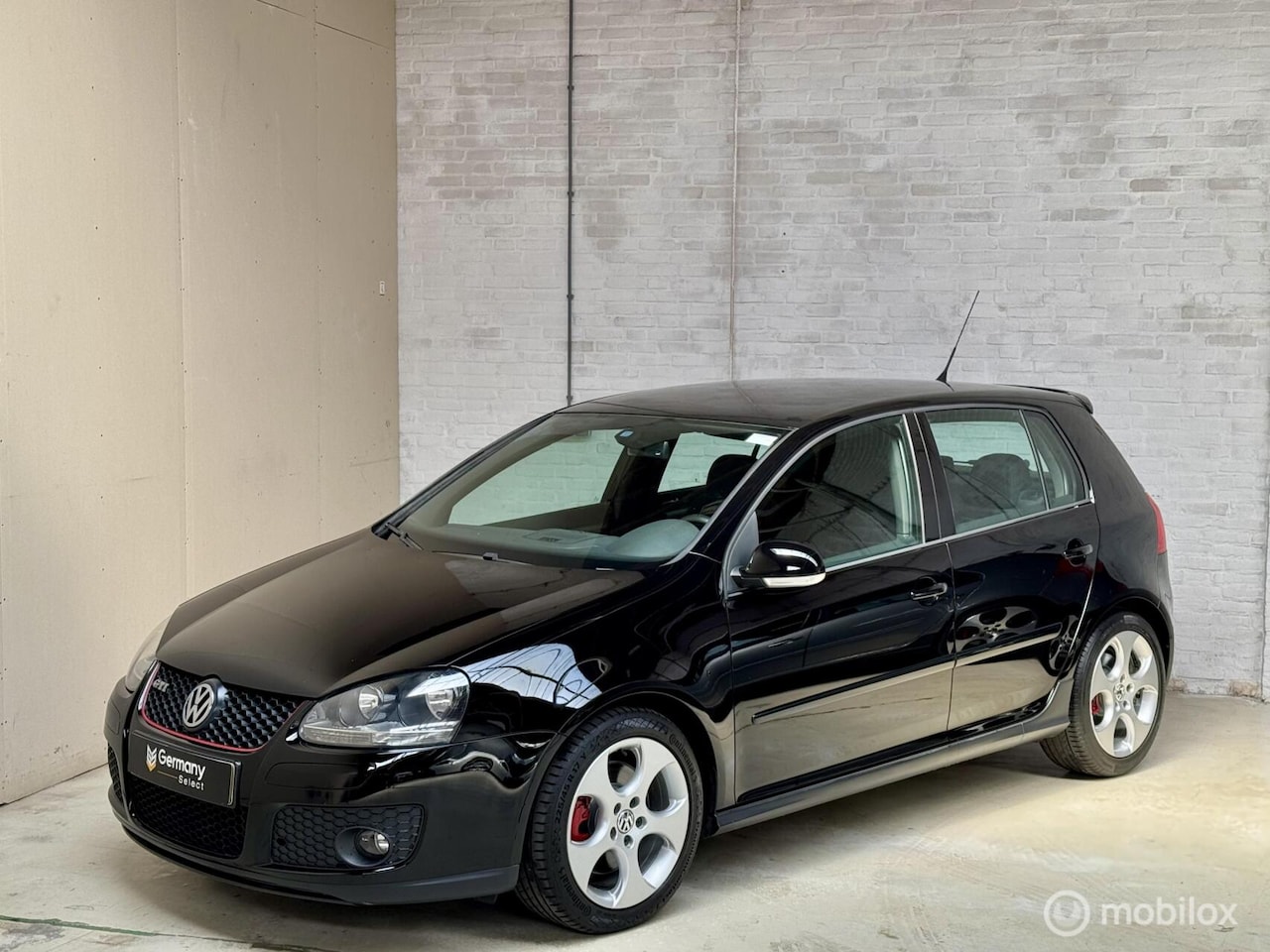 Volkswagen Golf - 5 2.0 TFSI GTI “Brilliant Schwarz” - AutoWereld.nl