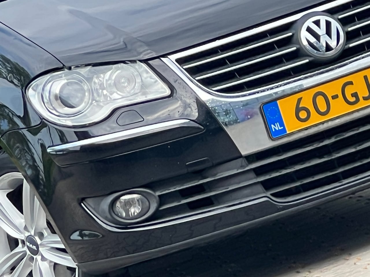 Volkswagen Touran - 1.4 TSI Highline Business - Panther Black - Clima/Cruise/Trekhaak - AutoWereld.nl
