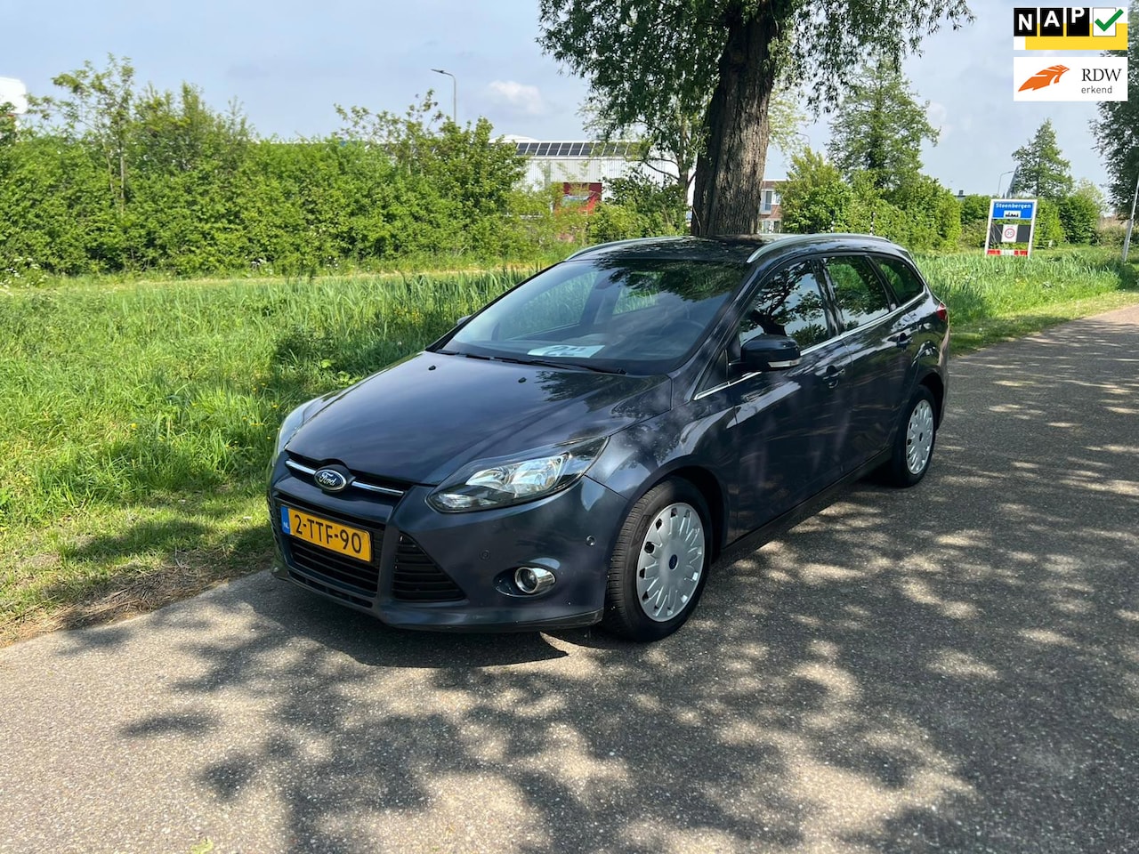 Ford Focus Wagon - 1.6 TDCI ECOnetic Lease Titanium 1e Eigenaar Navi Cruise Airco Pdc Voor En Achter - AutoWereld.nl