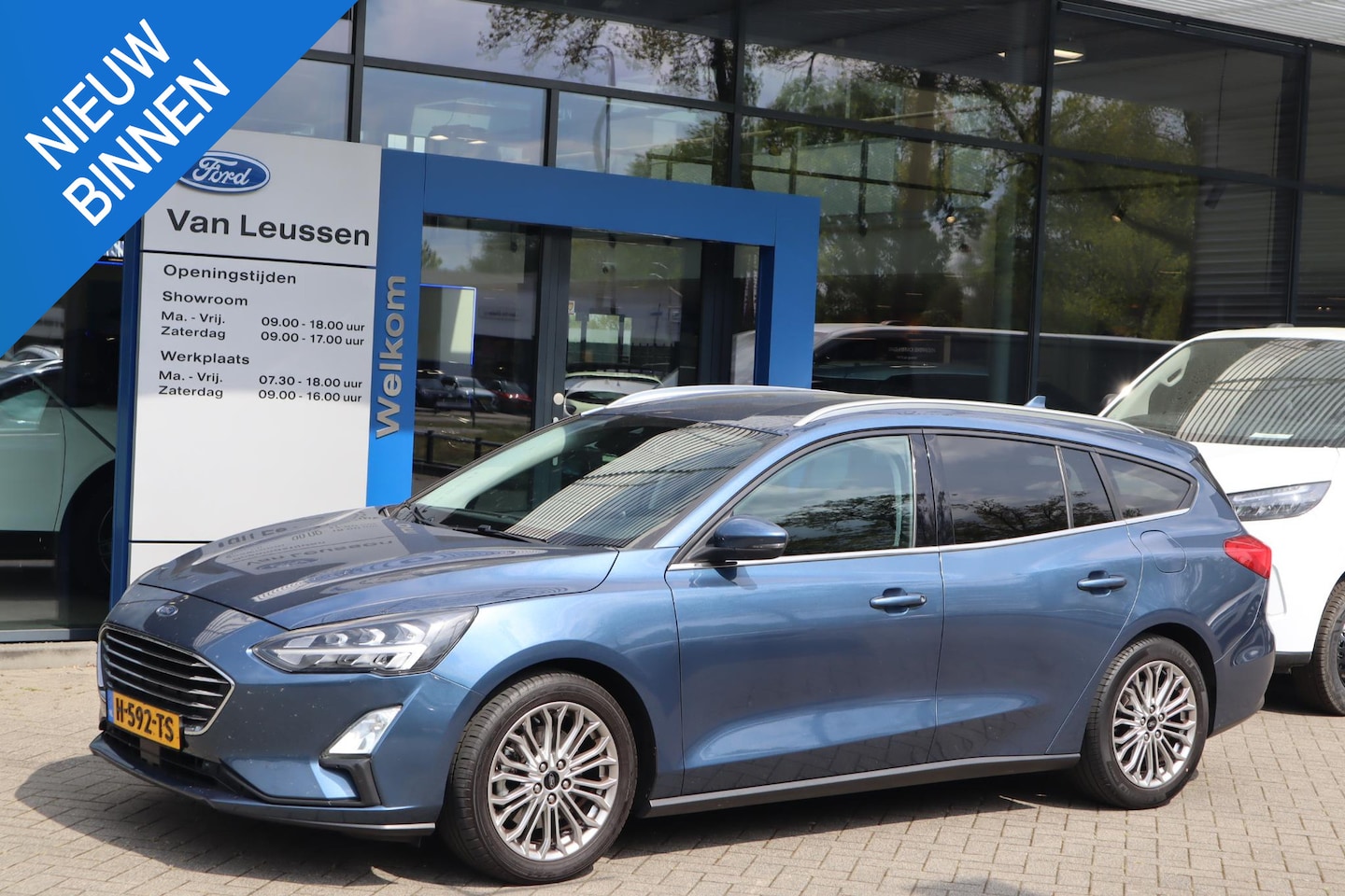 Ford Focus Wagon - 125PK TITANIUM BUSINESS WINTERPACK B&O-AUDIO P-SENSOREN V+A NAVI CLIMA - AutoWereld.nl