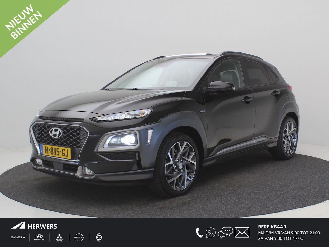 Hyundai Kona - 1.6 GDI HEV Premium Automaat / Trekhaak / Lederen bekleding / HUD Display / Navigatie / Ad - AutoWereld.nl