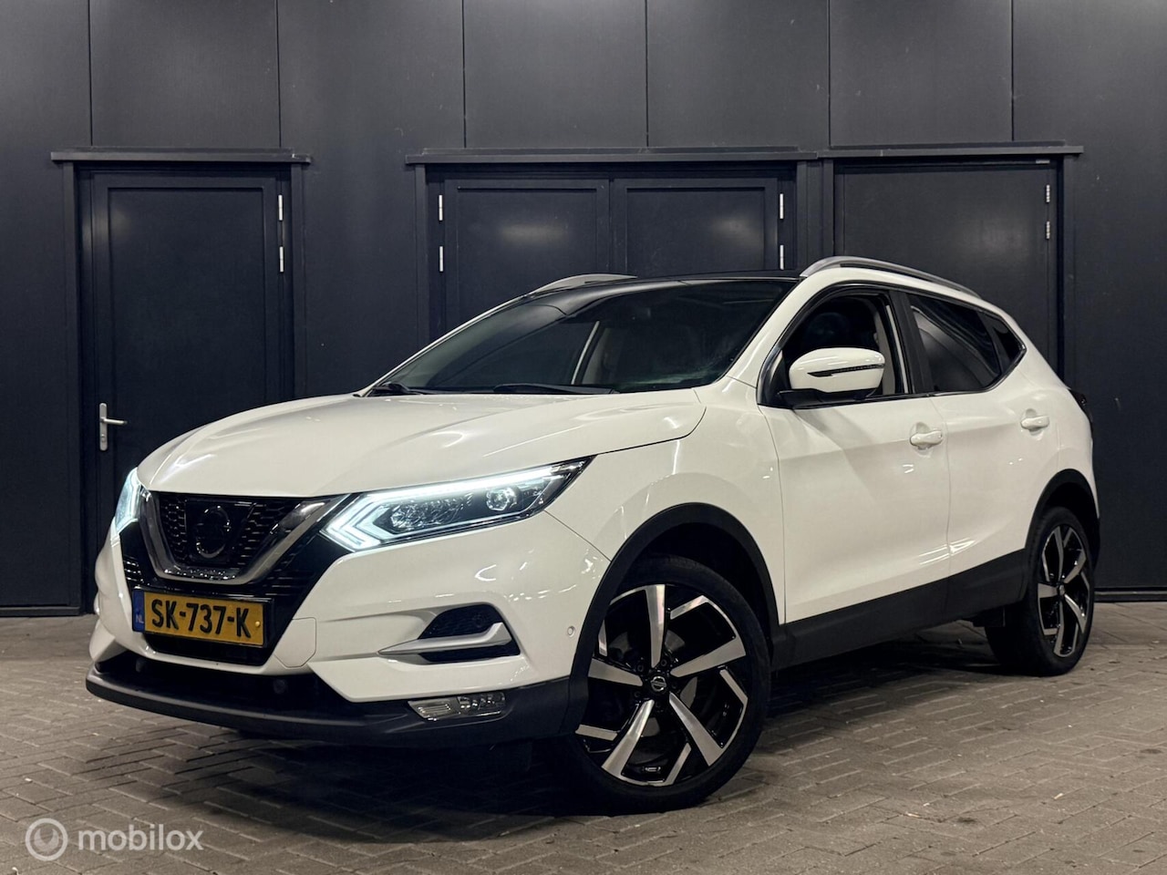 Nissan Qashqai - 1.2 360 camera|pano|stoelverwarming|bose - AutoWereld.nl