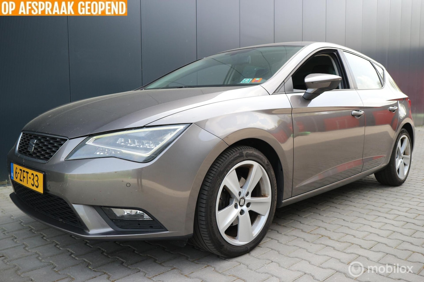 SEAT Leon - 1.6 TDI Ecomotive XENON/LED/2X-PDC/ECC/NAVIGATIE - AutoWereld.nl