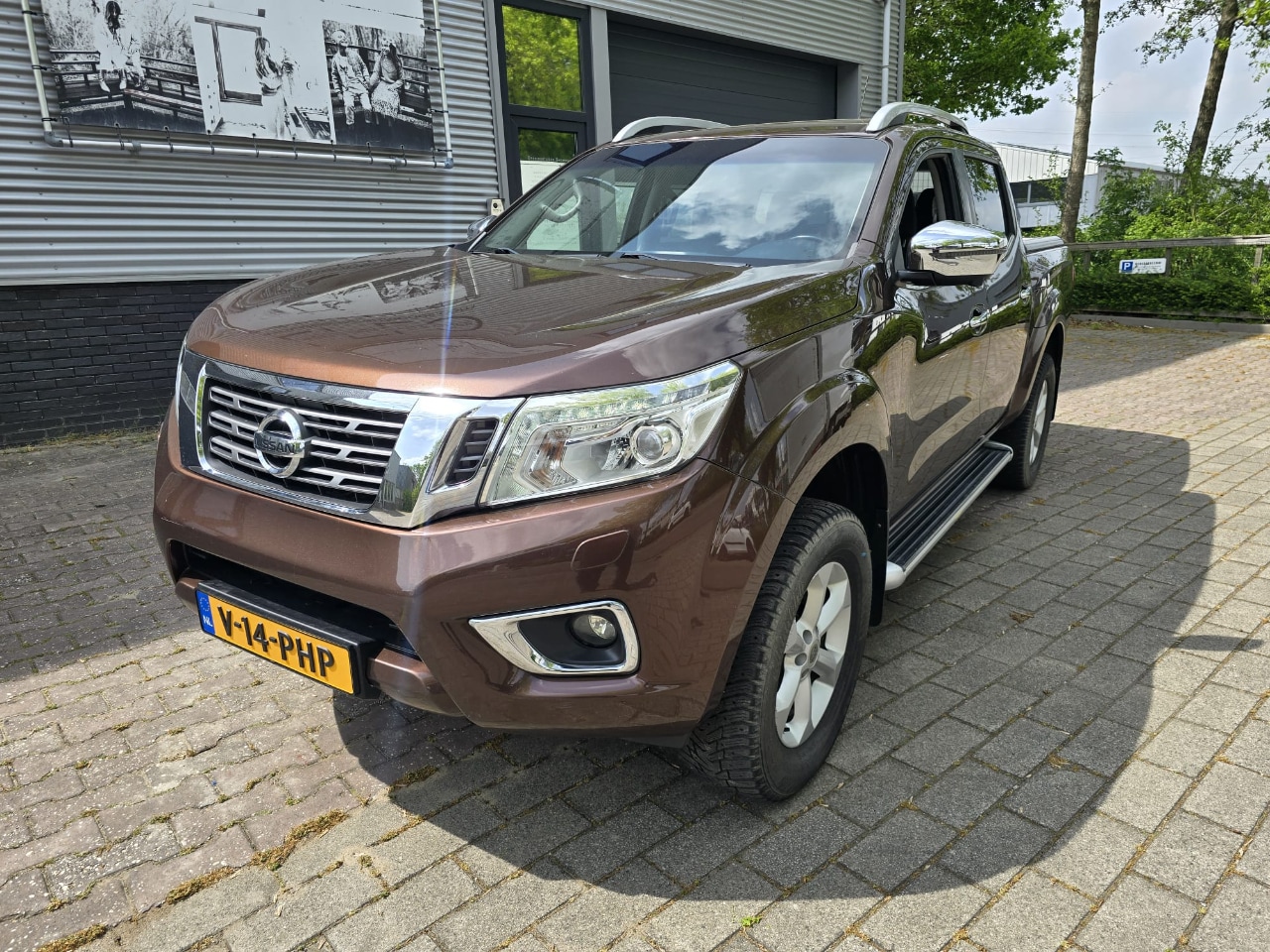 Nissan np300 - NAVARA 2.3Ci TEKNA DOUBLE CAB SNOEKS - AutoWereld.nl