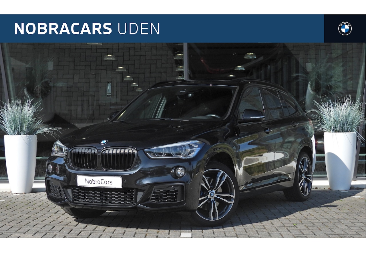 BMW X1 - sDrive20i High Executive M Sport Automaat / Panoramadak / Sportstoelen / Achteruitrijcamer - AutoWereld.nl