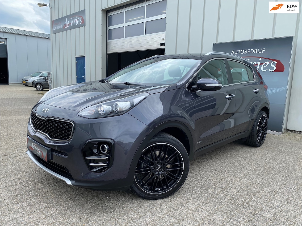 Kia Sportage - 1.6 T-GDI 4WD Automaat DynamicPlusLine / Clima / Cruise / Navi / Stuur en stoelverw. - AutoWereld.nl