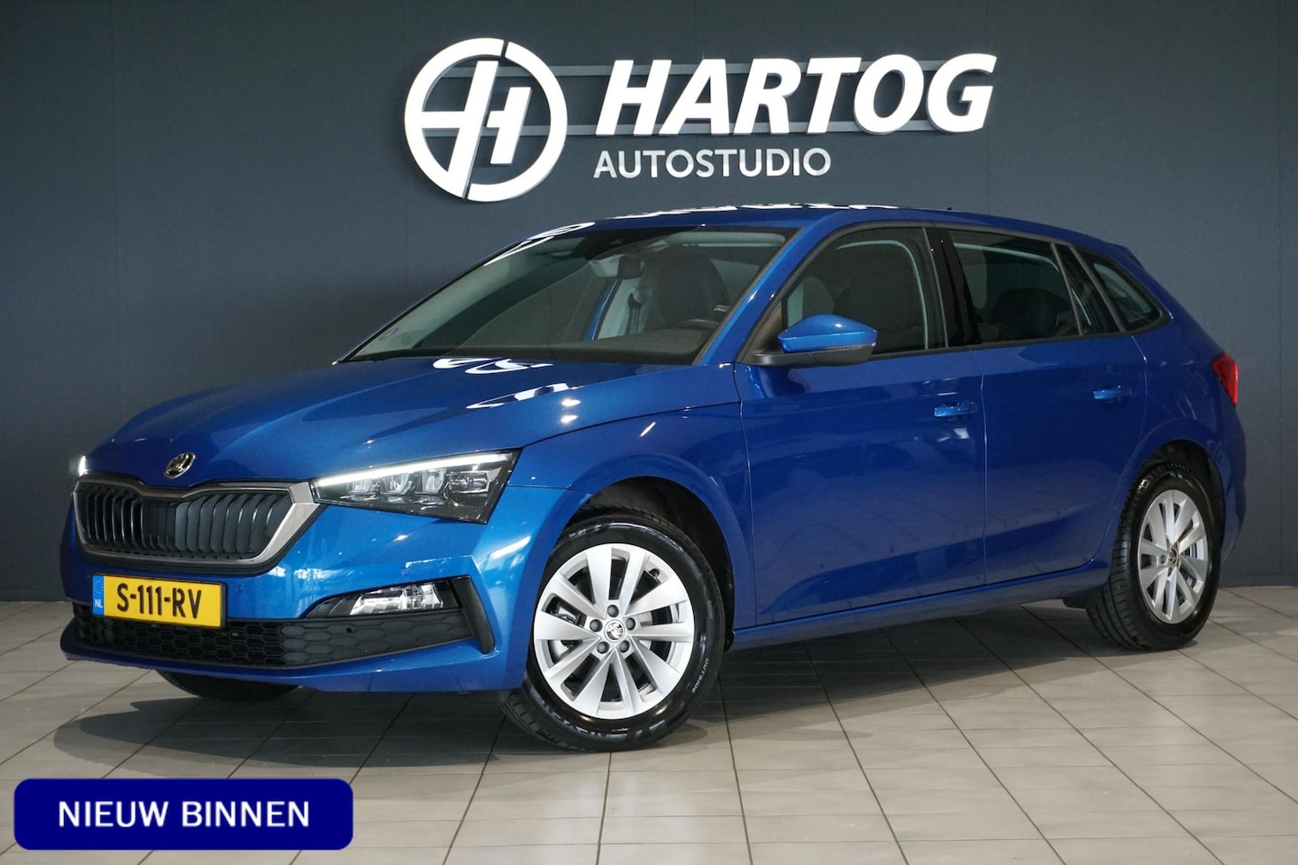 Skoda Scala - 1.0 TSI Business Edition + TREKHAAK / STOELVERWARMING / CAMERA - AutoWereld.nl