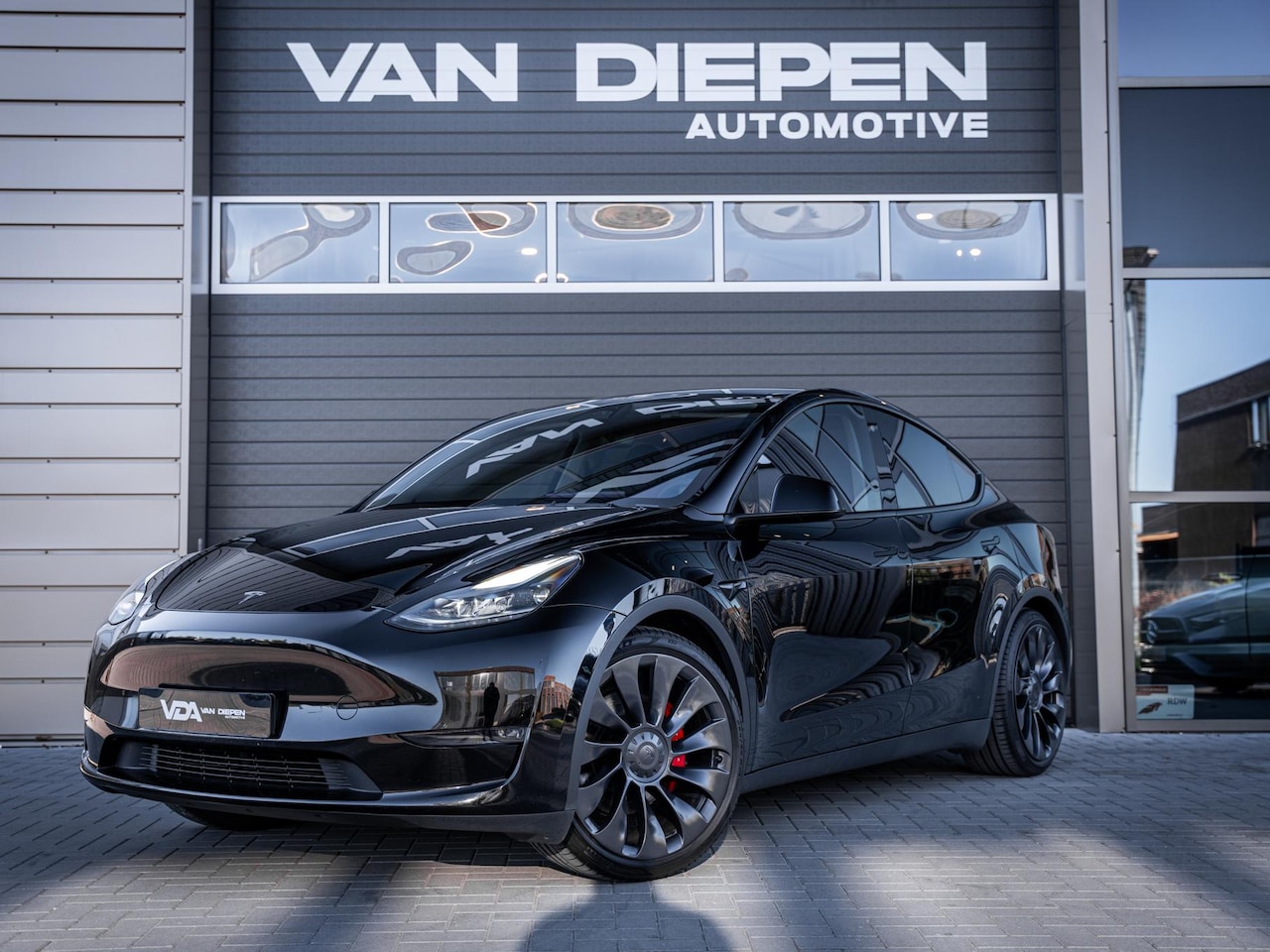 Tesla Model Y - Performance AWD 75 kWh Dual Motor l Carbon l 21'' l Panoramadak - AutoWereld.nl