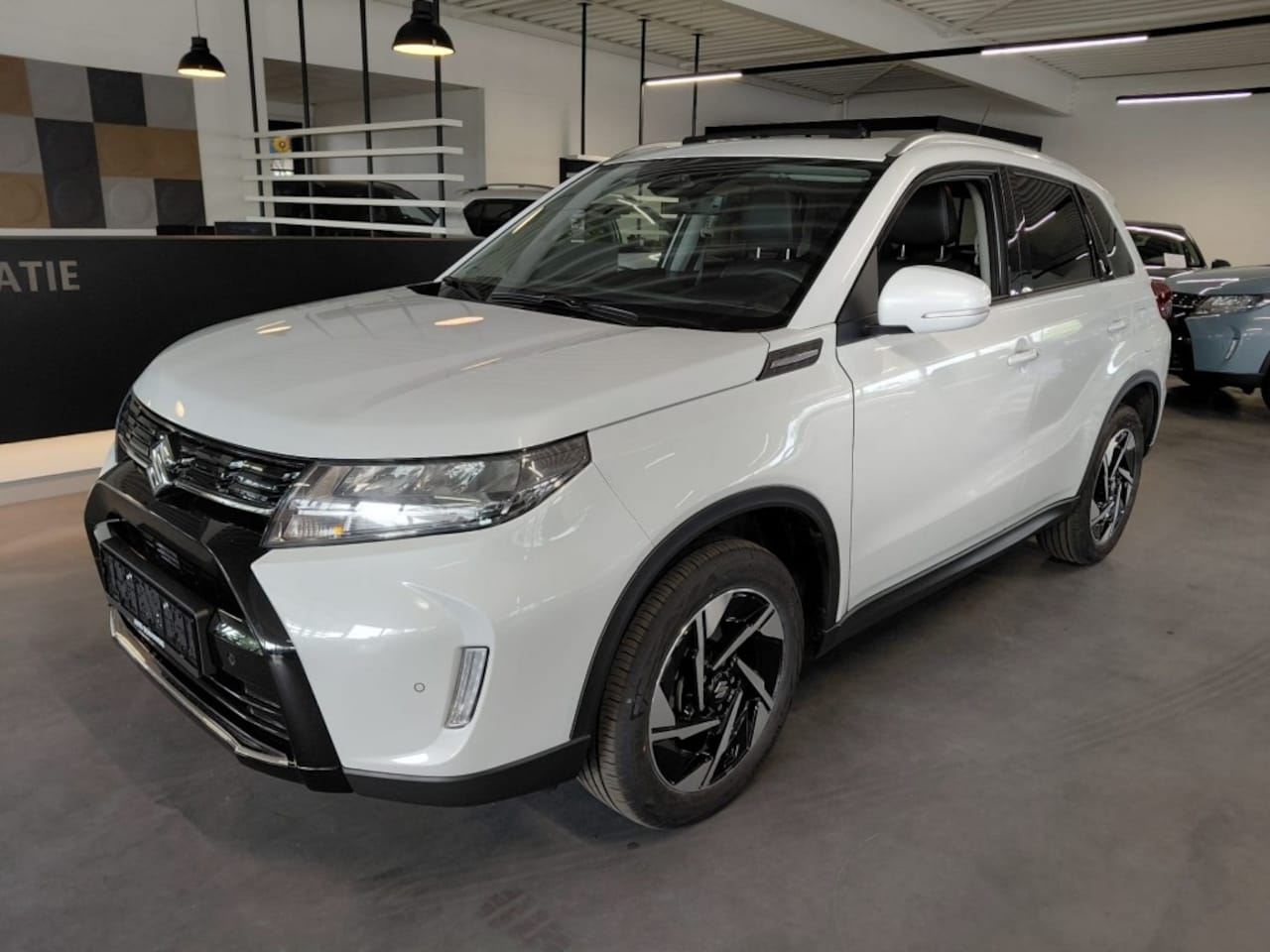 Suzuki Vitara - 1.4 STYLE PANO H.LEER CARPLAY CAMERA NAVI KEYLESS - AutoWereld.nl