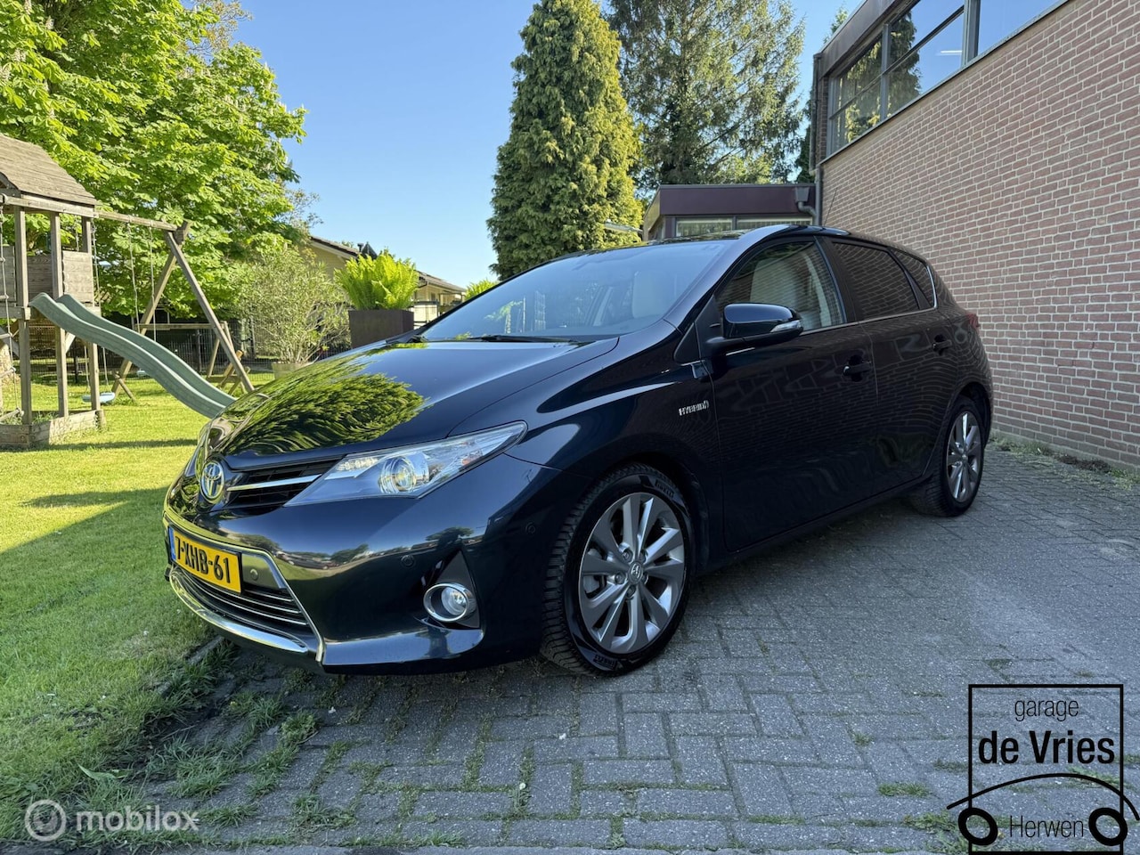 Toyota Auris - 1.8 Hybrid Executive 1.8 Hybrid Executive - AutoWereld.nl