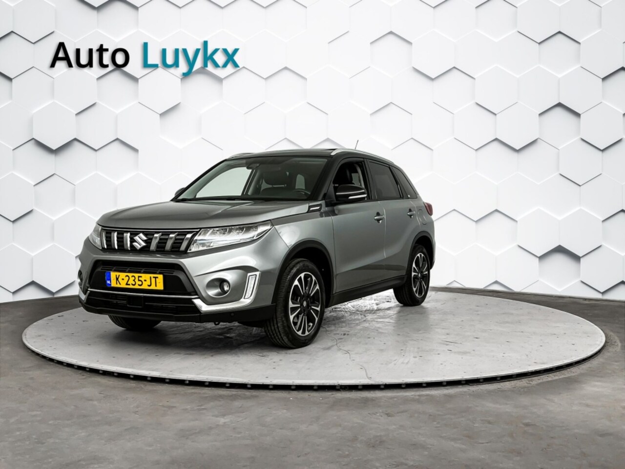 Suzuki Vitara - 1.4 Boosterjet Style Smart Hybrid | Panoramadak | Leder/Alcantara Bekleding | Trekhaak - AutoWereld.nl