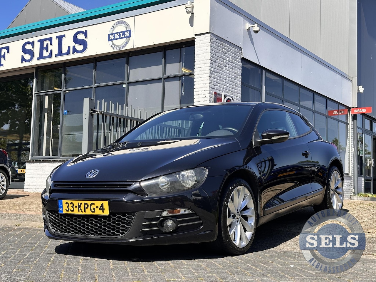 Volkswagen Scirocco - 1.4 TSI Highline 1.4 TSI Highline - AutoWereld.nl