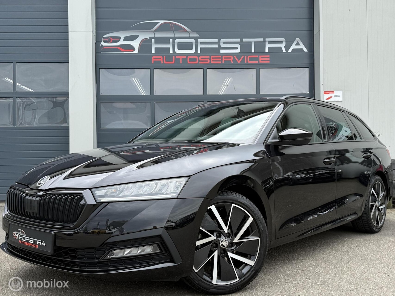 Skoda Octavia Combi - 1.0 TSI Sport Trekhk Carplay Sfeerverl - AutoWereld.nl