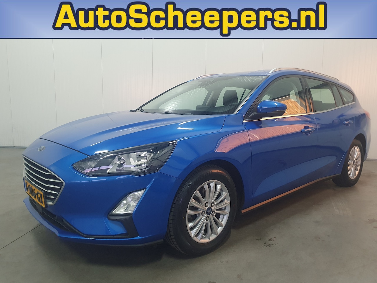 Ford Focus Wagon - 1.0 EcoBoost Titanium Business NAVI/CRUISE/AIRCO/LMV - AutoWereld.nl