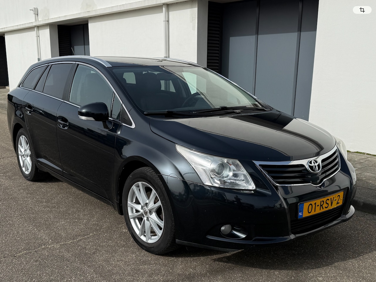Toyota Avensis Wagon - 2.0 VVTi Business Kleur zwart/blauw - AutoWereld.nl