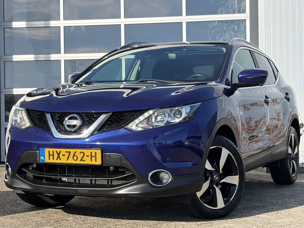 Nissan Qashqai - 1.2 Tekna 116pk | Panoramadak | Achteruitrijcamera | Bluetooth | Cruise control | Dab | Do - AutoWereld.nl
