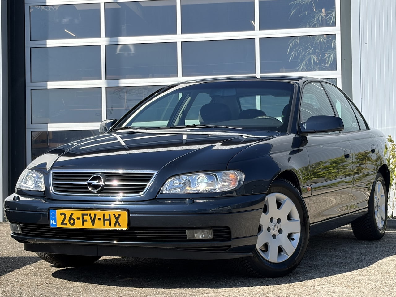 Opel Omega - 2.2i-16V Elegance 145pk | Origineel Nederlands | Automaat | Xenon koplampen | Cruise contr - AutoWereld.nl
