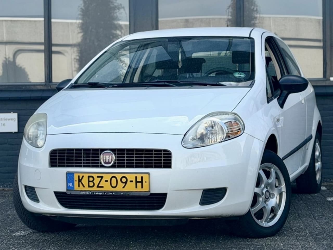Fiat Grande Punto - 1.4 Ed. Blue & Me - AutoWereld.nl