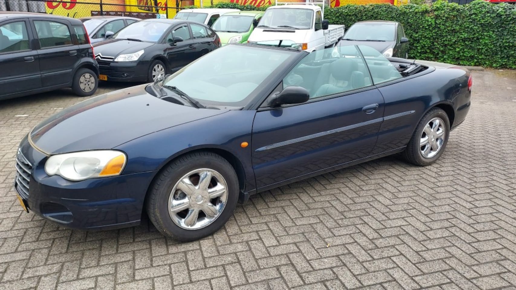 Chrysler Sebring Cabrio - 2.0i 16V Cabriolet / 114.000 km / OPKNAPPER / Lees goed de tekst - AutoWereld.nl