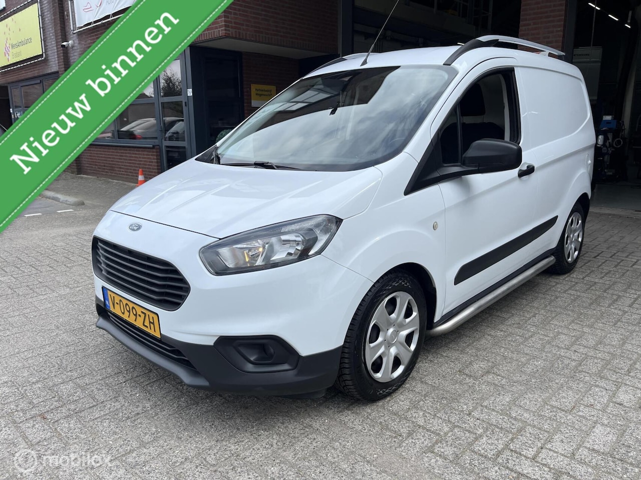 Ford Transit Courier - 1.5 TDCI 6-BAK*AIRCO*TREKHAAK* - AutoWereld.nl