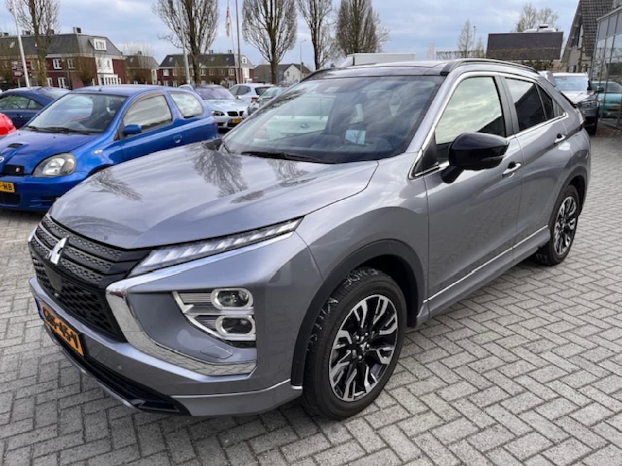 Mitsubishi Eclipse Cross - 2.4 PHEV Instyle 4WD Pano / Leder / Trekh. - AutoWereld.nl