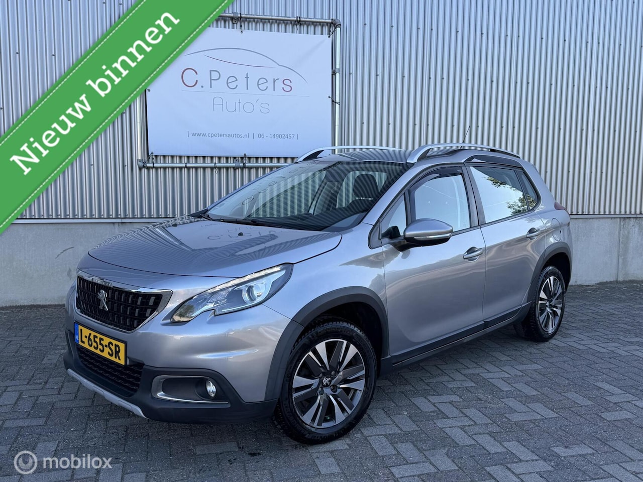 Peugeot 2008 - 1.2 PureTech Allure 2019 / Half Leer / Carplay / Navigatie / DAB+ / 4seizoensbanden - AutoWereld.nl