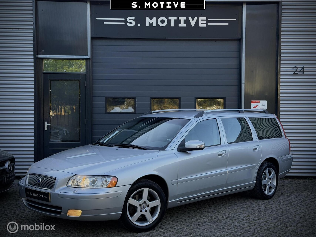 Volvo V70 - 2.4 Edition Sport LPG automaat Trekhaak 2eig Leder Dealer Onderhouden - AutoWereld.nl