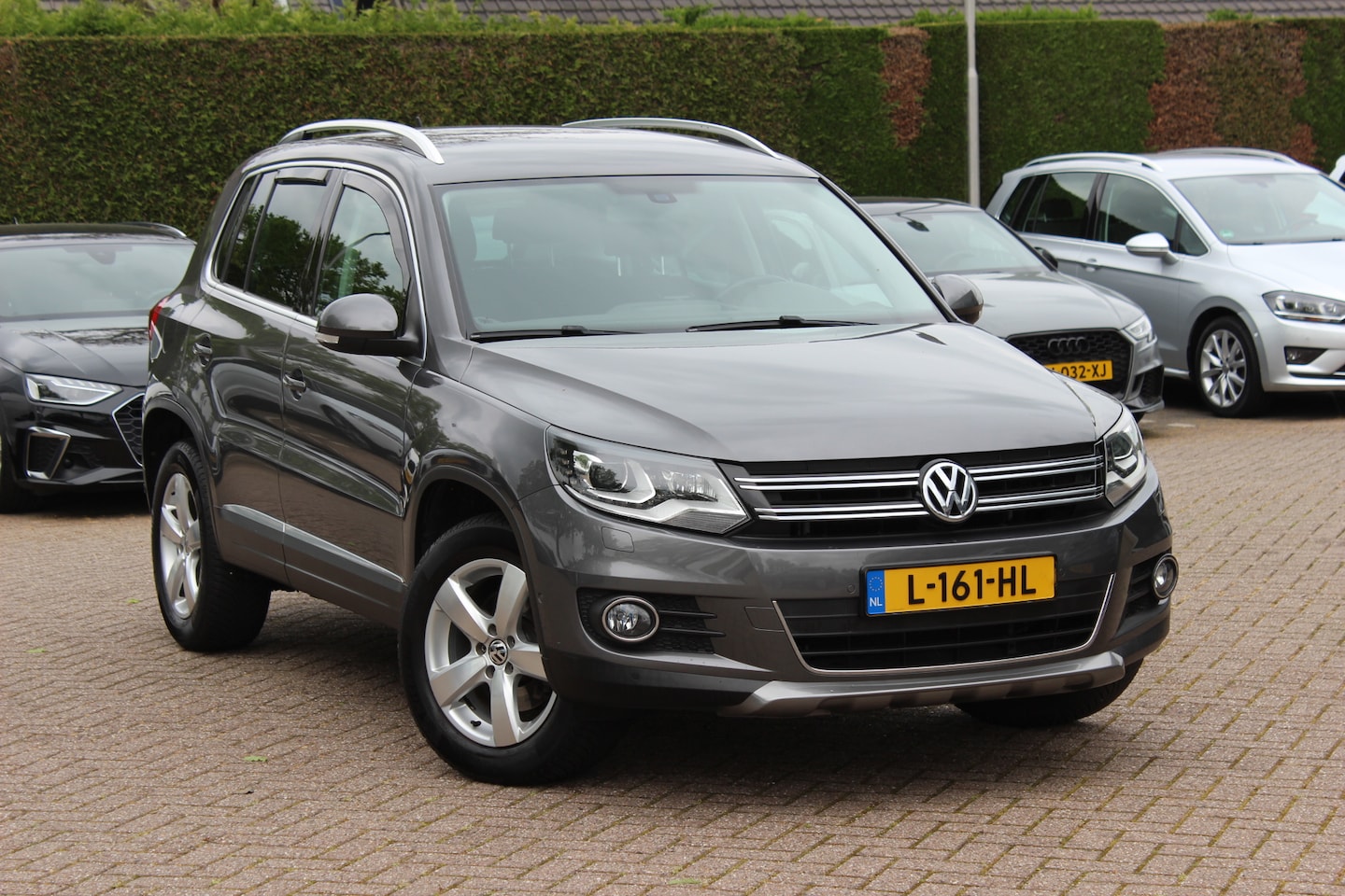 Volkswagen Tiguan - 2.0 TSI Sport&Style 4Motion / Trekhaak / Android Auto / Parkeerhulp V+A / 17'' / Xenon / D - AutoWereld.nl