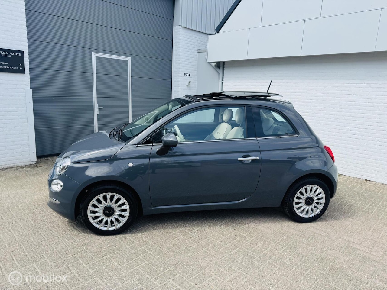 Fiat 500 - 1.2 Lounge Panorama Schuifdak Airco 15 inch - AutoWereld.nl