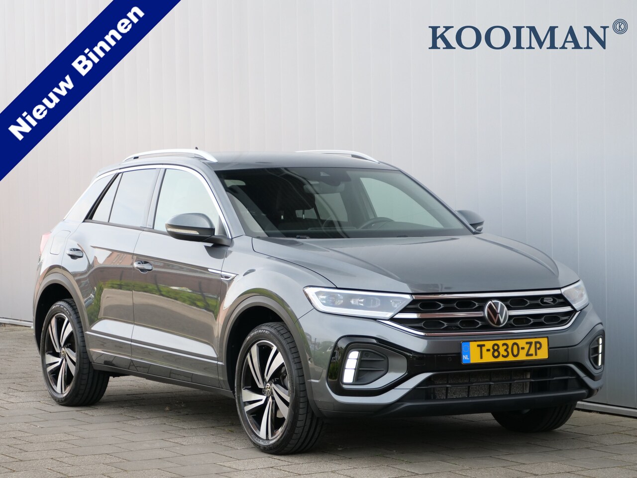 Volkswagen T-Roc - 1.5 TSI Sport Business R 150 pk Automaat Navi / Apple Carplay / DAB / Stoeverwarming / Cam - AutoWereld.nl